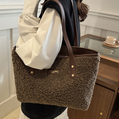 Woman carrying a coffee plush tote shoulder bag