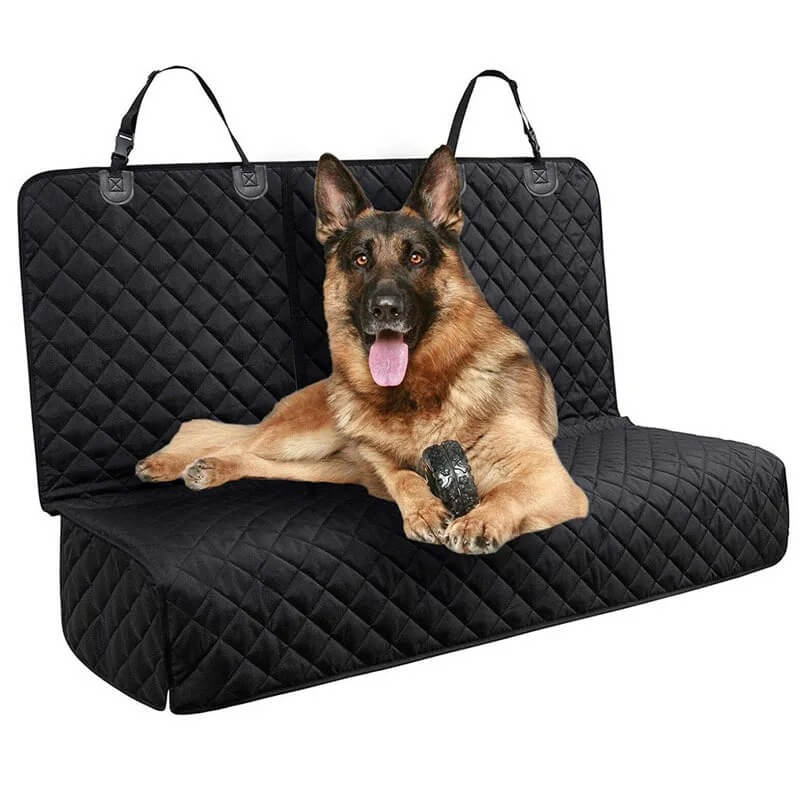 Dog sitting on black car seat cover with waterproof and dirt-resistant callouts