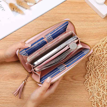 Open long wallet displaying multiple card, cash and coin compartments