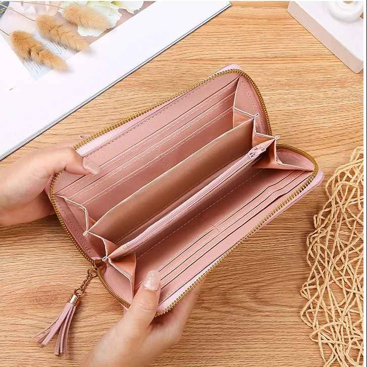 Open long wallet displaying multiple card and cash compartments