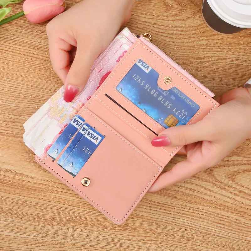 Interior of short wallet showing card slots, cash and photo holder compartment