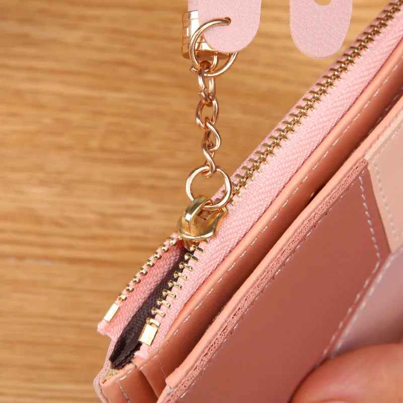 Long patchwork wallet zip closure